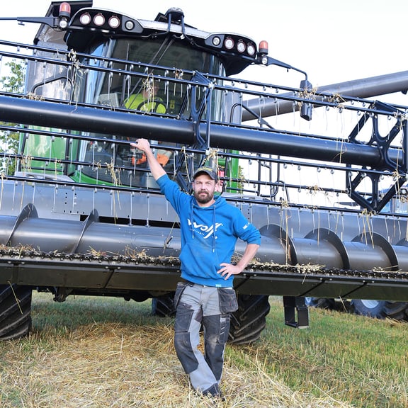 Tommi Hasu and his combine harvester.